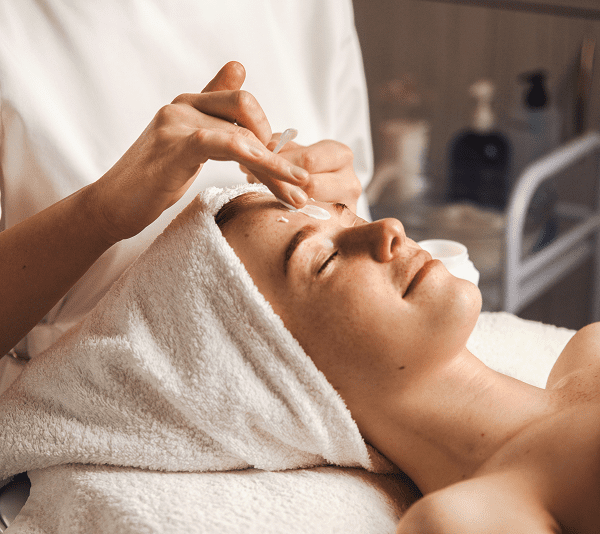 Facial treatment at a spa session.